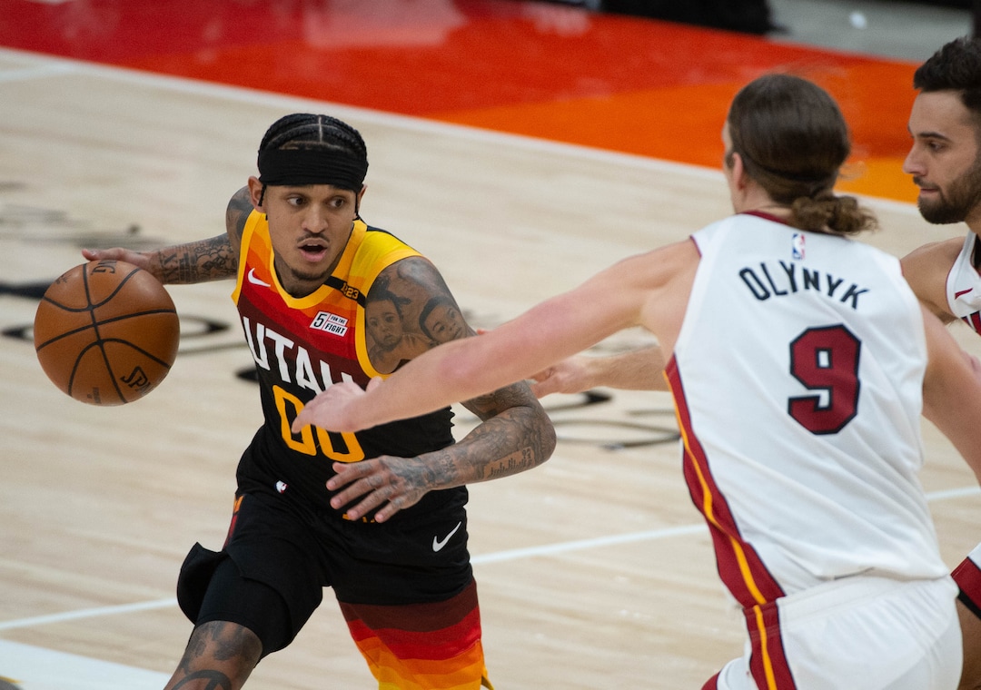 (Francisco Kjolseth  | The Salt Lake Tribune) Utah Jazz guard Jordan Clarkson (00) goes up against Miami Heat forward Kelly Olynyk (9) as the Utah Jazz take on the Miami Heat at Vivint Smart Home Arena in Salt Lake City, on Saturday, Feb. 13, 2021.