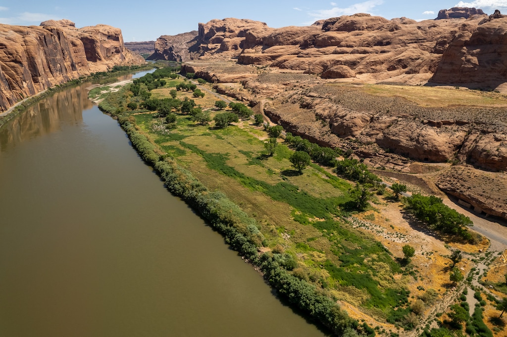 (Trent Nelson  |  The Salt Lake Tribune) The Colorado River flows next to Kane Creek Boulevard in Moab on Thursday, July 27, 2023.