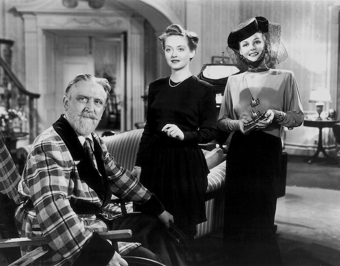 ( Courtesy Warner Bros. Pictures) Monty Woolley, left, plays New York radio personality Sheldon Whiteside, who takes over the lives of an Ohio family in the 1942 comedy "The Man Who Came to Dinner." Bette Davis (center) plays Whiteside's long-suffering assistant, Maggie Cutler; Ann Sheridan (right) plays Lorraine Sheldon, an actress brought in to disrupt Maggie's romantic plans with a young journalist.