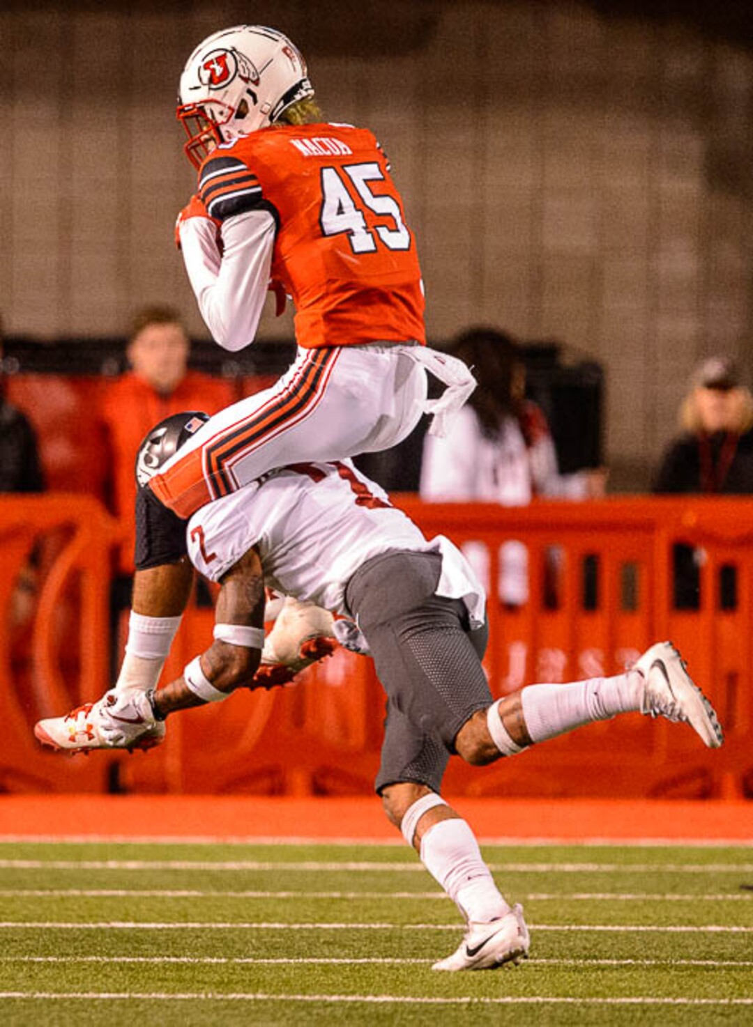(Trent Nelson | The Salt Lake Tribune)  Utah Utes wide receiver Samson Nacua (45) pulls in a pass while Washington State Cougars defensive back Robert Taylor (2) runs underneath him, as the University of Utah hosts Washington State, NCAA football in Salt Lake City, Saturday November 11, 2017.