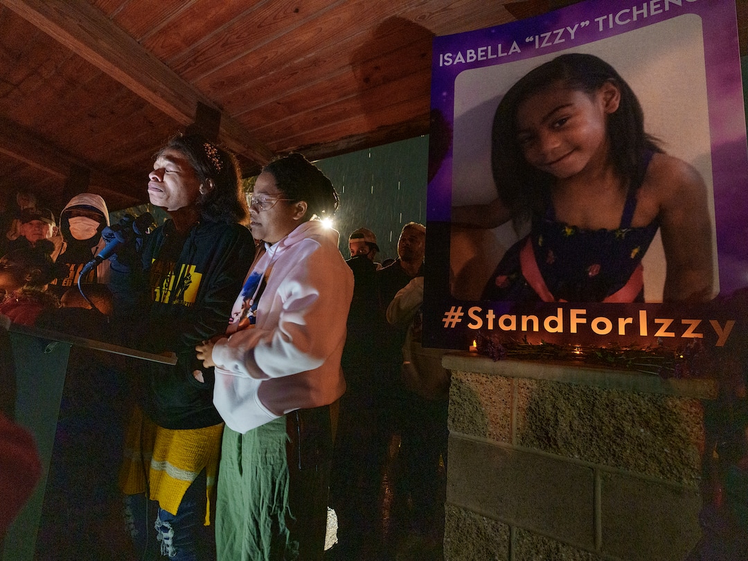 (Leah Hogsten | The Salt Lake Tribune) Brittany Tichenor-Cox, center, joined by her sister Jasmine Rhodes, right, speaks about her daughter Izzy Tichenor, Nov. 9, 2021. Hundreds joined the Tichenor family in mourning the death of 10-year-old Isabella "Izzy" Tichenor during a vigil at Foxboro Hollow Park in North Salt Lake on Tuesday.