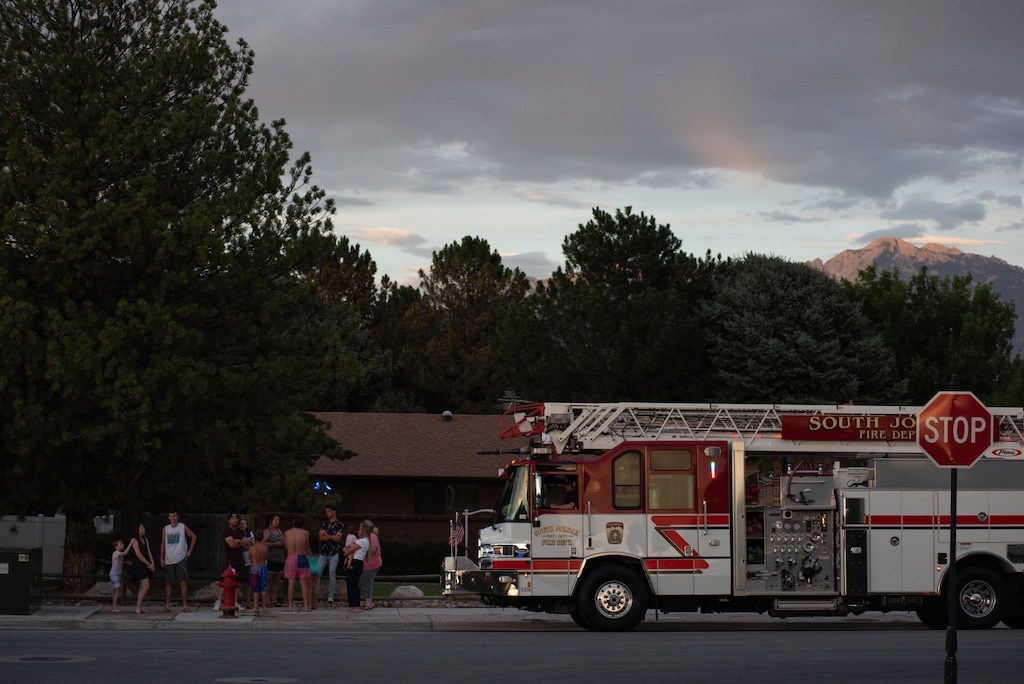 (Niki Chan Wylie |Special to The Tribune) A neighborhood crowd waits to see the blast in South Jordan on Friday, July 24.