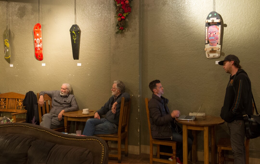 (Rick Egan  |  The Salt Lake Tribune)      A skateboard exhibit hangs on the wall at Nostalgia, as live music is presented monthly, during the gallery stroll, Friday, Nov. 16, 2018.