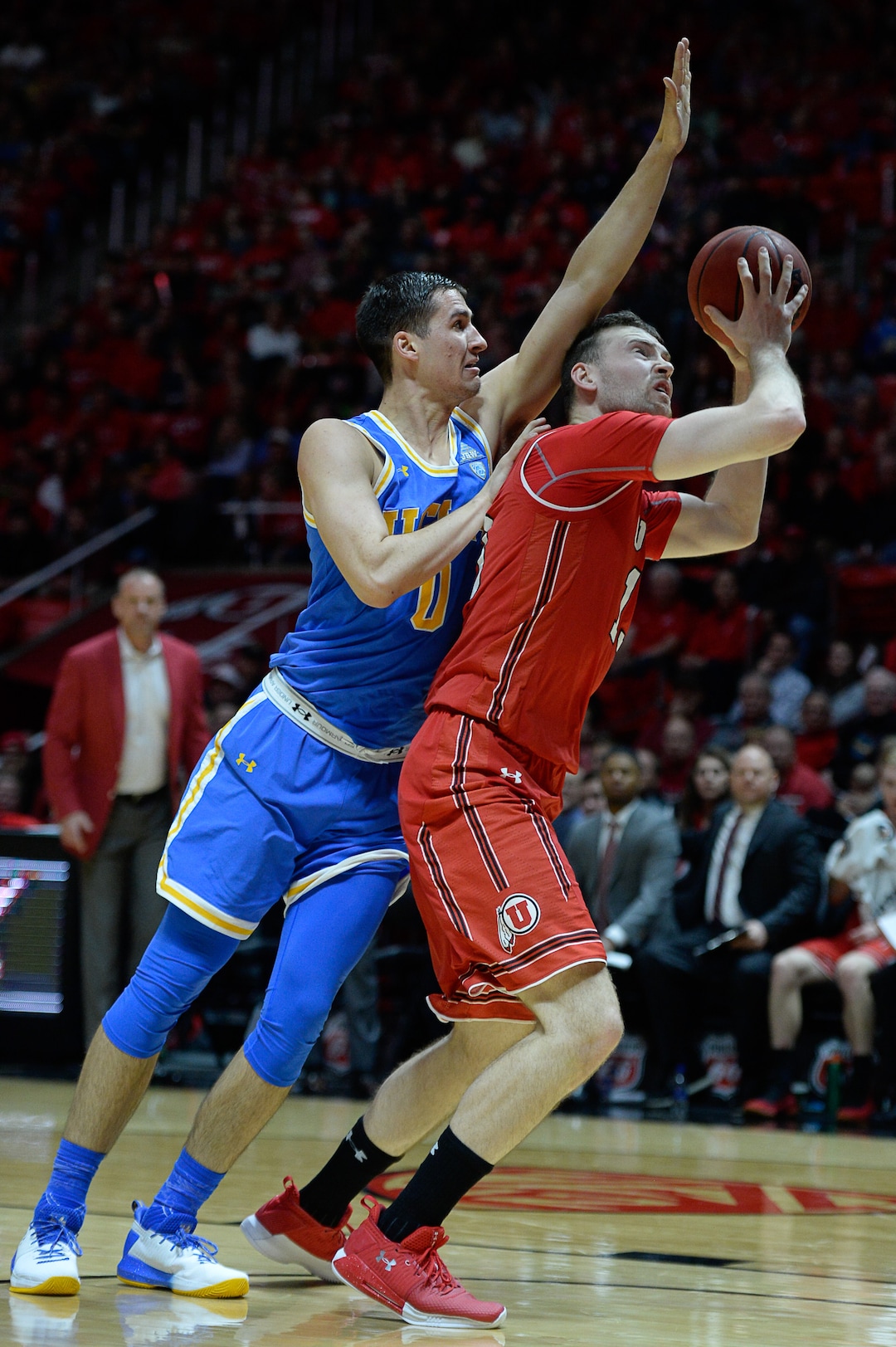 (Francisco Kjolseth  |  The Salt Lake Tribune)  UCLA Bruins forward Alex Olesinski (0) pressures Utah Utes forward David Collette (13) as the University of Utah hosts UCLA in NCAA basketball at the Huntsman Center in Salt Lake City, Thursday, Feb. 22, 2018.