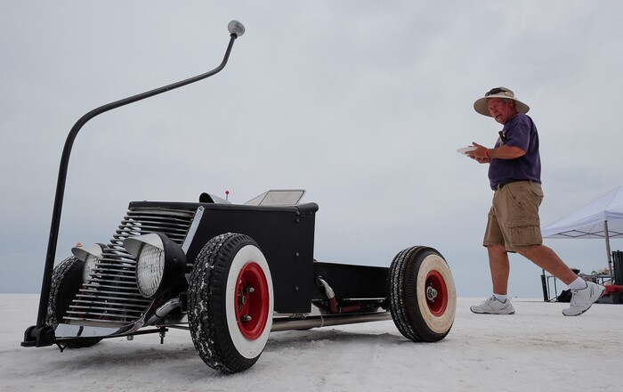 (Francisco Kjolseth  |  The Salt Lake Tribune)  Rich Lofstrom of Kennewick, Washington keeps his hand made swap meet wagons on hand during during Speed Week at the Bonneville Salt Flats outside Wendover on Monday, Aug. 14, 2017.