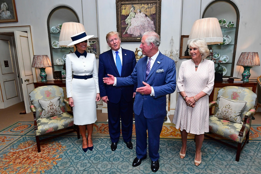 US President Donald Trump, centre left and his wife, first lady Melania, left, listen to Britain's Prince Charles and Camilla, the Duchess of Cornwall prior to afternoon tea at Clarence House, in London, Monday, June 3, 2019. Trump is on a three-day state visit to Britain. (Victoria Jones/Pool Photo via AP)