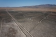 (Bethany Baker | The Salt Lake Tribune) A road runs through the Hansey Valley where the proposed Stratos data center would be located near Snowville on Monday, July 13, 2026. The project's developers submitted a new water-rights application on Thursday for water that Bar H Ranch has used for irrigation.