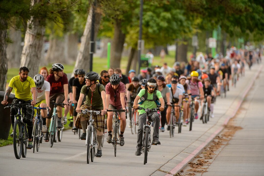 (Trent Nelson | The Salt Lake Tribune)Cyclists gather and ride around Salt Lake City's Liberty Park, Saturday July 21, 2018, in remembrance of Cameron Hooyer, a rider who was killed by a FrontRunner train during a 999 Ride on Thursday.