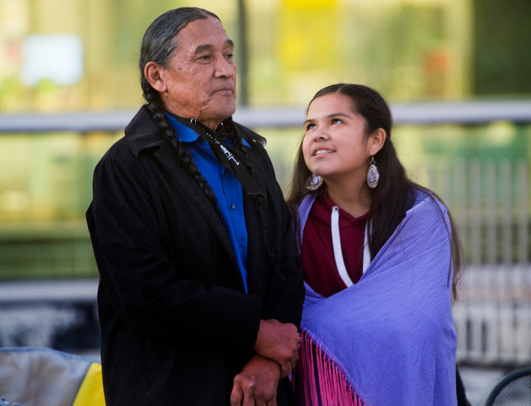 (Rick Egan  |  The Salt Lake Tribune)  Butch Russell, of Provo,  stands next to his 13-year-old grand daughter named Sacred Rattle Woman, during the Indigenous Peoples Day celebration, hosted by the Utah League of Native American Voters and PANDOS (Peaceful Advocates for Native Dialogue and Organizing Support) at the Salt Lake City Library, Monday, October 9, 2017.