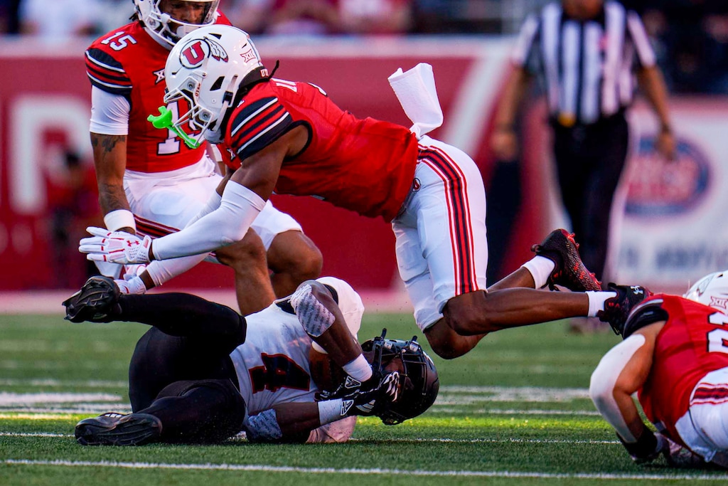 (Trent Nelson | The Salt Lake Tribune) Utah Utes cornerback Kenan Johnson (1) collides with Southern Utah Thunderbirds running back Targhee Lambson (4) as the Utah Utes host the Southern Utah Thunderbirds, NCAA football in Salt Lake City on Thursday, Aug. 29, 2024.