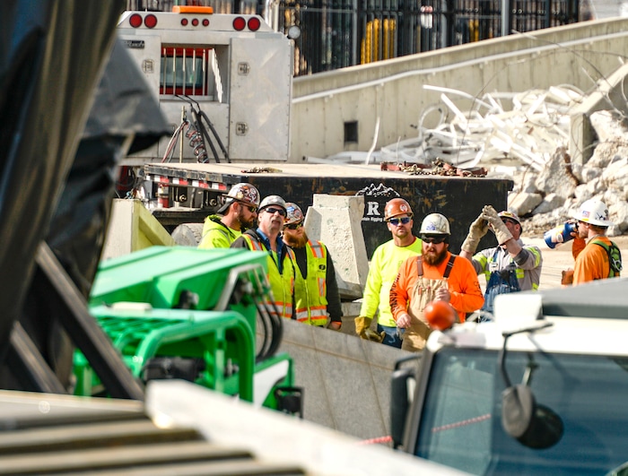 (Leah Hogsten | The Salt Lake Tribune) Workers with Layton Construction and Mountain Crane began dismantling the 2002 Winter Olympic Cauldron located on the University of Utah's Rice-Eccles Stadium complex, Thursday, Feb. 13, 2020. As part of the stadium's expansion project, the 19-year old cauldron will be restored to its former brilliance and re-installed on the grounds of Rice-Eccles Stadium, north of the ticket office, in 2021.
