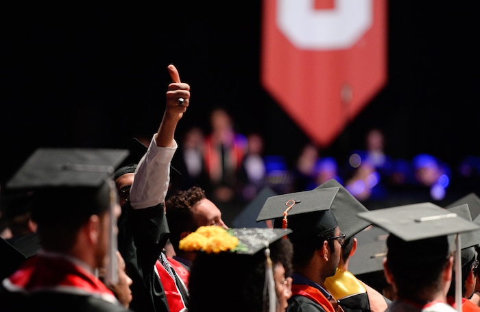 (Francisco Kjolseth  |  The Salt Lake Tribune)  University of Utah in Salt Lake City celebrates its largest graduating class with 8,568 graduates for their 2018 commencement ceremonies as Khaled Altholoth graduating with a masters in chemical engineering gives family the thumbs up on Thursday, May 3, 2018, at the Jon M. Huntsman Center.