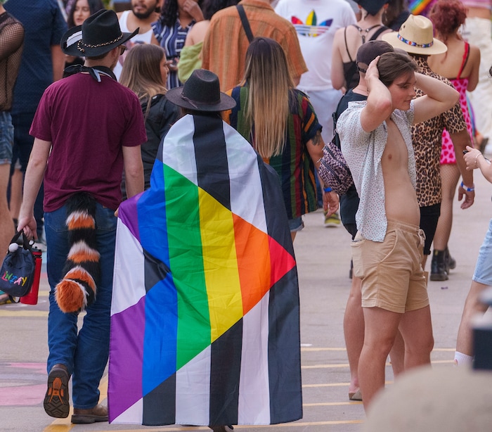 (Leah Hogsten | The Salt Lake Tribune)  Pride festival revelers enjoy the Utah Pride Festival at Washington Square, Saturday, June 4, 2022. 