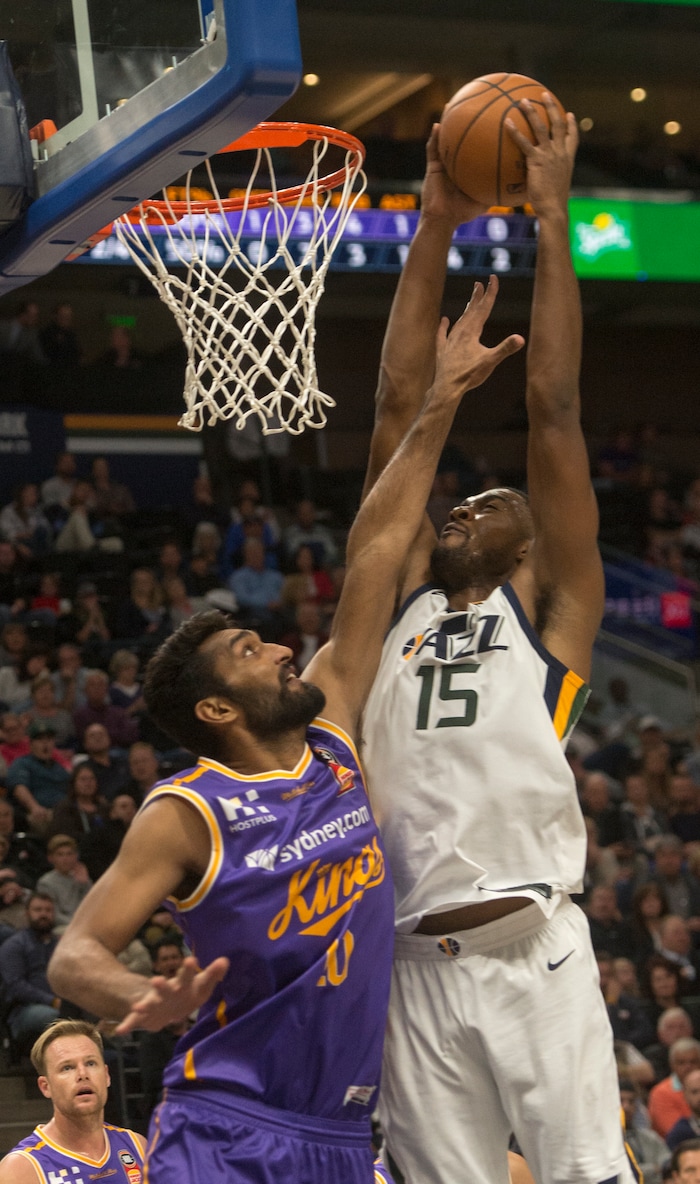 (Rick Egan  |  The Salt Lake Tribune) Utah Jazz forward Derrick Favors (15) dunks the ball over Sydney Kings center, Amritpal Singh, (10), in preseason basketball Utah Jazz vs.Sydney Kings, in Salt Lake City, Sunday, October 2, 2017.



