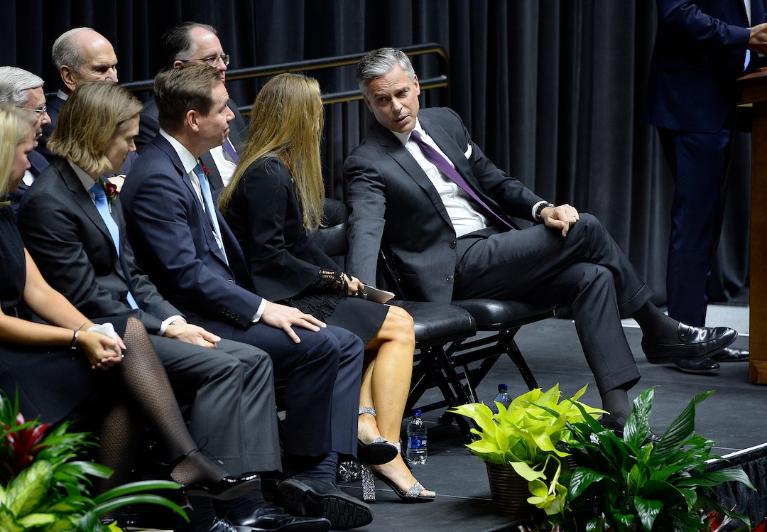 Scott Sommerdorf | The Salt Lake TribuneAmbassador Jon Huntsman Jr. reaches over to speak with his sister Christena Huntsman Parkin after she spoke at the funeral services for Jon M. Huntsman, Sr., Saturday, February, 10, 2018. 