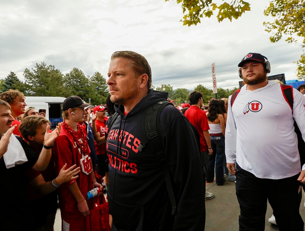 (Chris Samuels | The Salt Lake Tribune) Utah offensive coordinator Jason Beck walks to Rice-Eccles Stadium before Utah plays Texas Tech on Sept. 20.