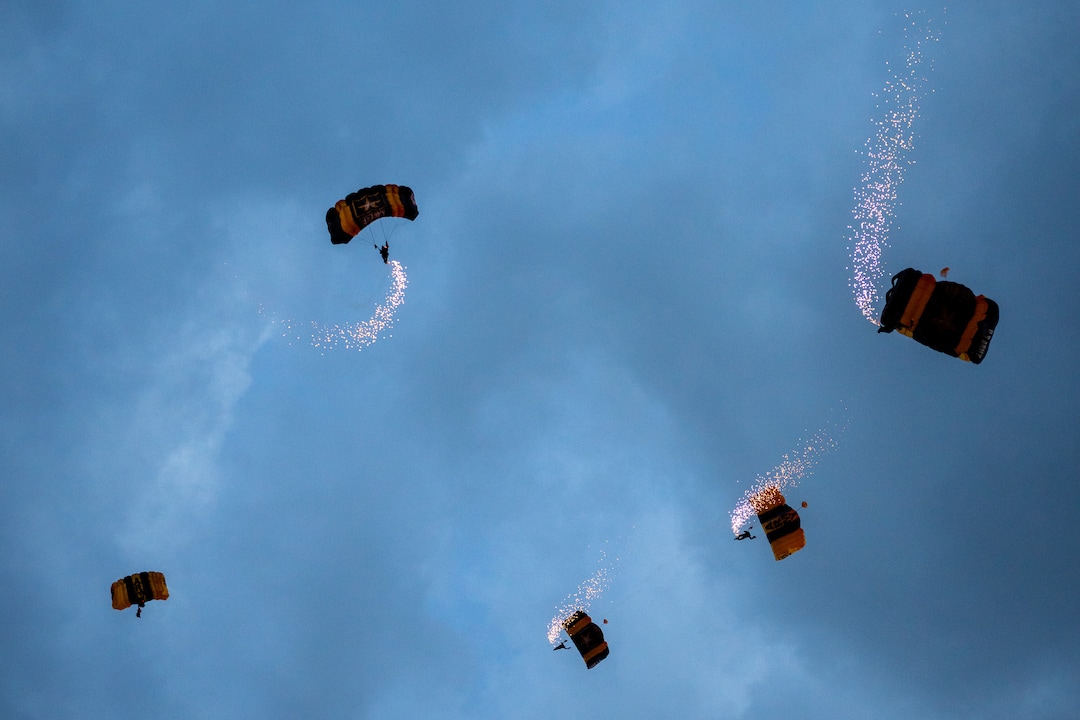 (Trent Nelson  |  The Salt Lake Tribune) The United States Army Parachute Team, nicknamed the Golden Knights, at Stadium of Fire in Provo on Saturday, July 2, 2022.