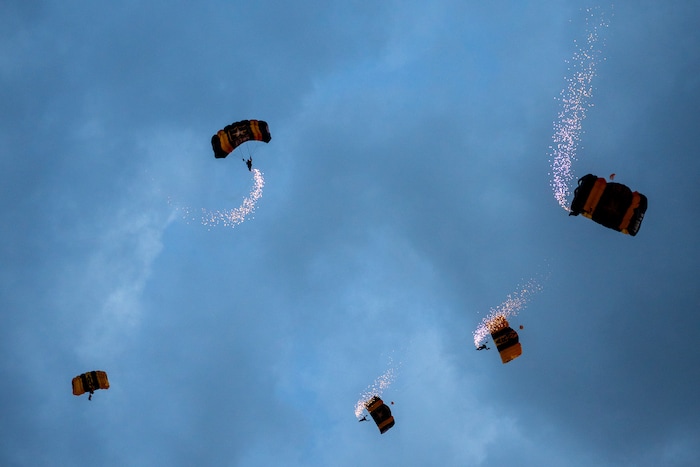(Trent Nelson | The Salt Lake Tribune) The United States Army Parachute Team, nicknamed the Golden Knights, at Stadium of Fire in Provo on Saturday, July 2, 2022.