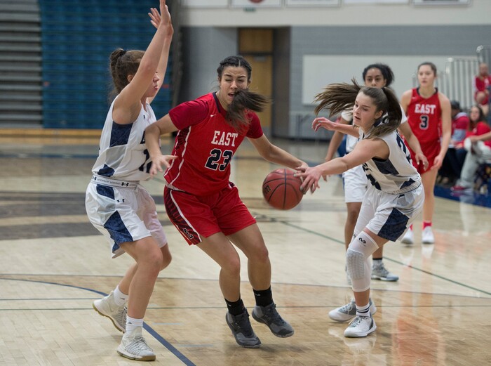 (Scott Sommerdorf | The Salt Lake Tribune)
East's Liana Kaitu'u has the ball swatted out of her hands by Copper Hills' Breaunna Gillen during first half play. Copper Hills defeated East 82-62, Friday, December 29, 2017.