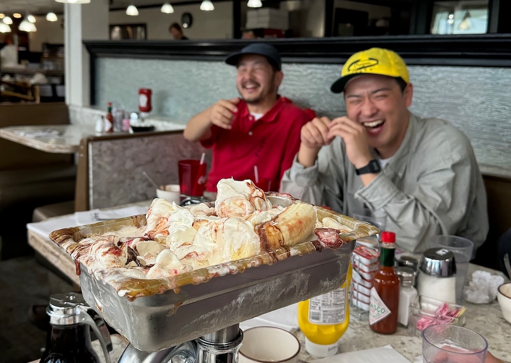 (Chase Anderson | Utah State University) Patrons of Angie's Diner in Logan enjoy their go at the establishment's legendary Kitchen Sink ice cream food challenge.