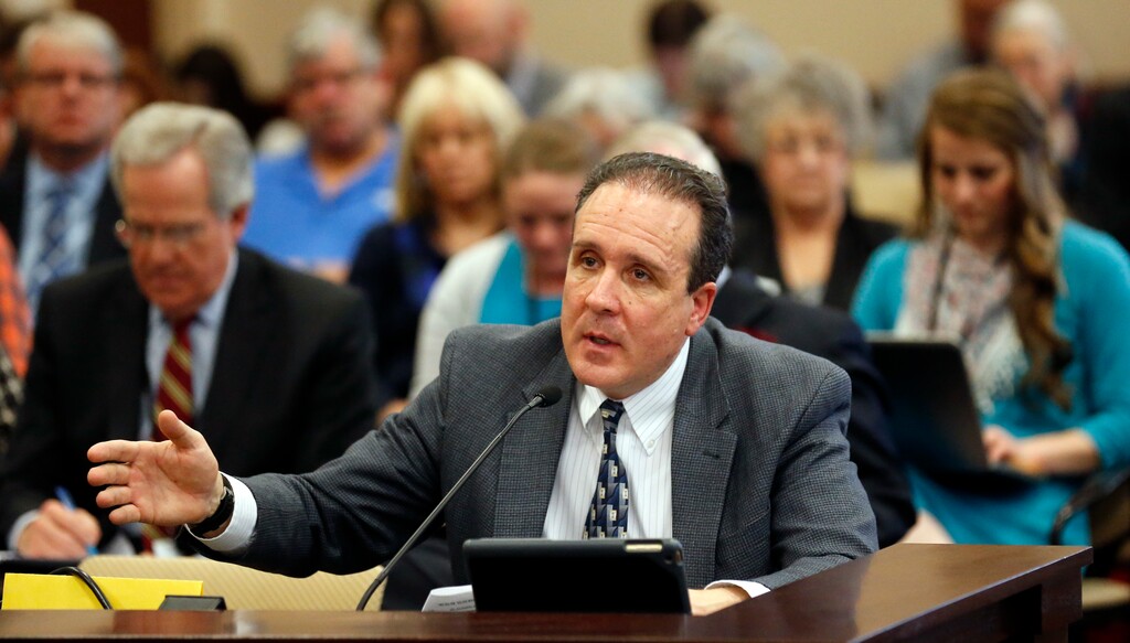 Rep. Brad Daw, R-Orem, testifies during a hearing at the Utah State Capitol Wednesday, Jan. 31, 2018, in Salt Lake City. A Utah lawmaker's proposals that would allow terminally ill people to use certain forms of marijuana and farmers to grow it for research purposes passed their first hurdle in a committee despite criticism that the piecemeal approach doesn't go far enough. Daw, said during the hearing that the measures help dying people try another alternative that may help and provides a way for researchers to get marijuana locally. (AP Photo/Rick Bowmer)
