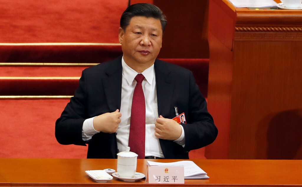 Chinese President Xi Jinping attends a plenary session of China's National People's Congress (NPC) at the Great Hall of the People in Beijing Friday, March 9, 2018. (AP Photo/Aijaz Rahi)