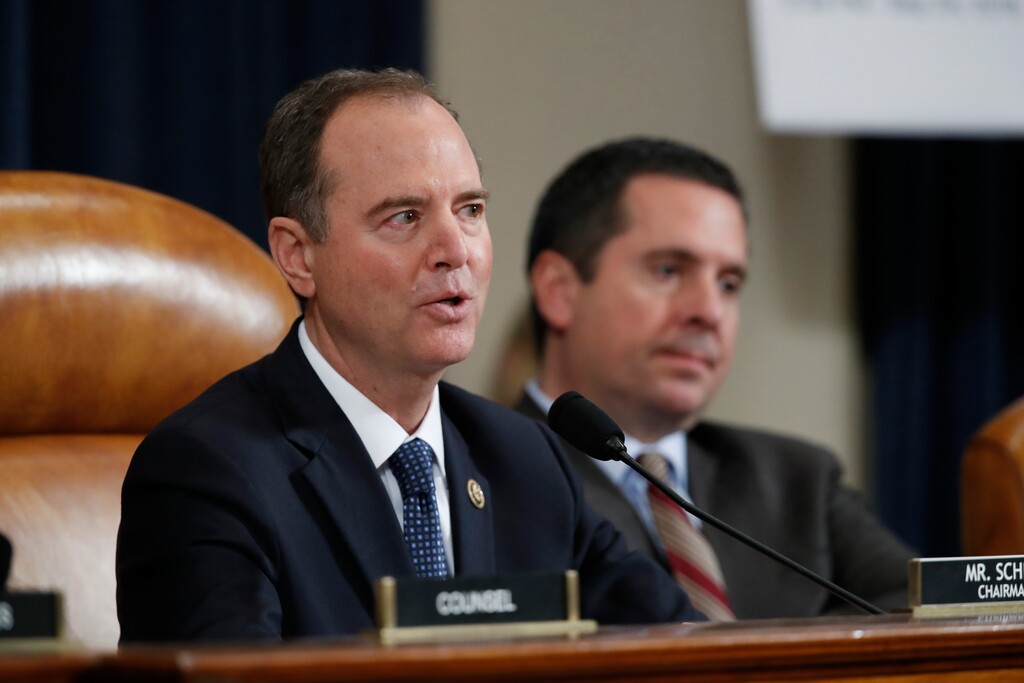 (Alex Brandon | AP) House Intelligence Committee Chairman Adam Schiff, D-Calif., question Jennifer Williams, an aide to Vice President Mike Pence, and National Security Council aide Lt. Col. Alexander Vindman, as they testify before the House Intelligence Committee on Capitol Hill in Washington, Tuesday, Nov. 19, 2019, during a public impeachment hearing of President Donald Trump's efforts to tie U.S. aid for Ukraine to investigations of his political opponents. Ranking member Rep. Devin Nunes, R-Calif., right.