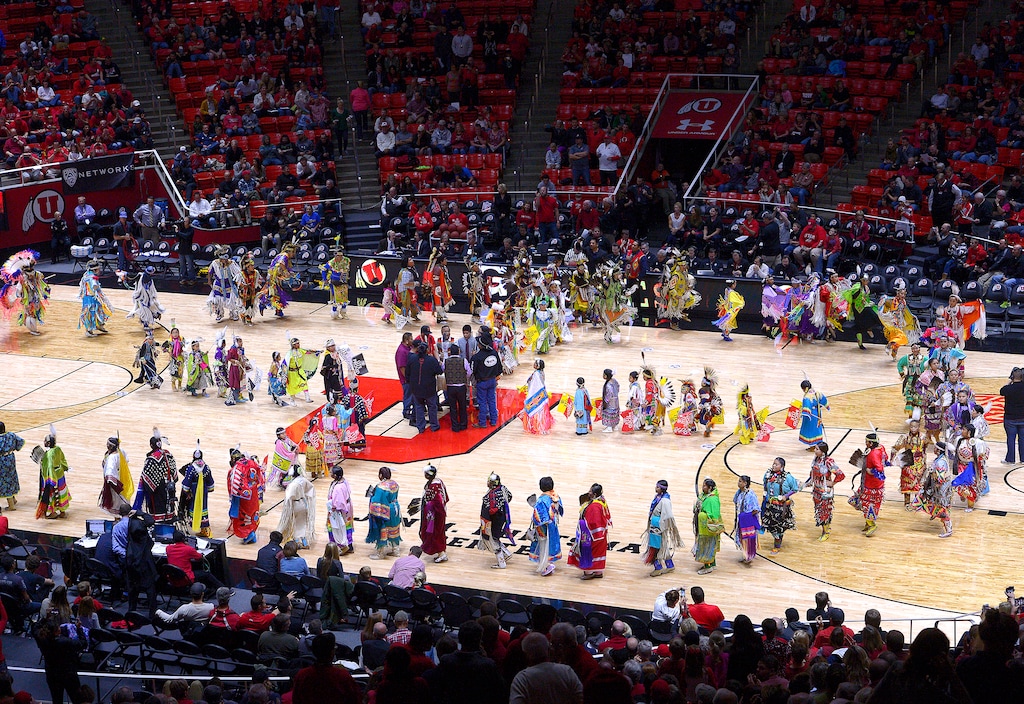 Leah Hogsten  |  The Salt Lake TribuneTo celebrate the Ute Proud campaign, a partnership between the Ute tribe and the University of Utah, and Native American Heritage Month, members of the Ute tribe filled the basketball court in dance during halftime of   the University of Utah and UC Riverside game, November 21, 2014, at the Jon M. Huntsman Center. 