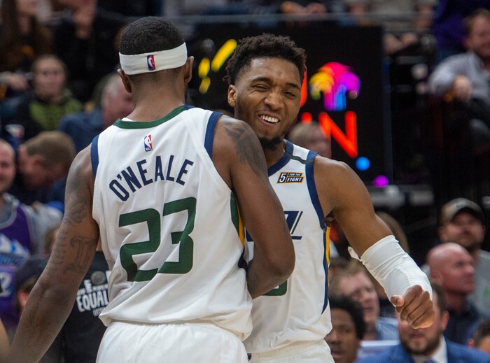 (Rick Egan  |  The Salt Lake Tribune) Utah Jazz guard Donovan Mitchell (45) celebrates after Utah Jazz forward Royce O'Neale (23)stole an inbound pass and was found as he went to the hoop, in NBA action between the Utah Jazz and the Washington Wizards, in Salt Lake City, Friday, February 28, 2020