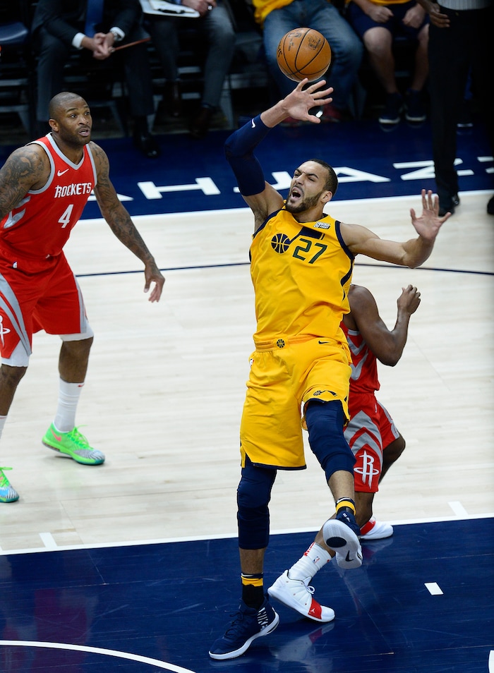 (Scott Sommerdorf | The Salt Lake Tribune)
Utah Jazz center Rudy Gobert (27) is fouled by Houston's Paul George during first half play. The Rockets led the Jazz 58-48 at the half, Sunday, May 6, 2018.