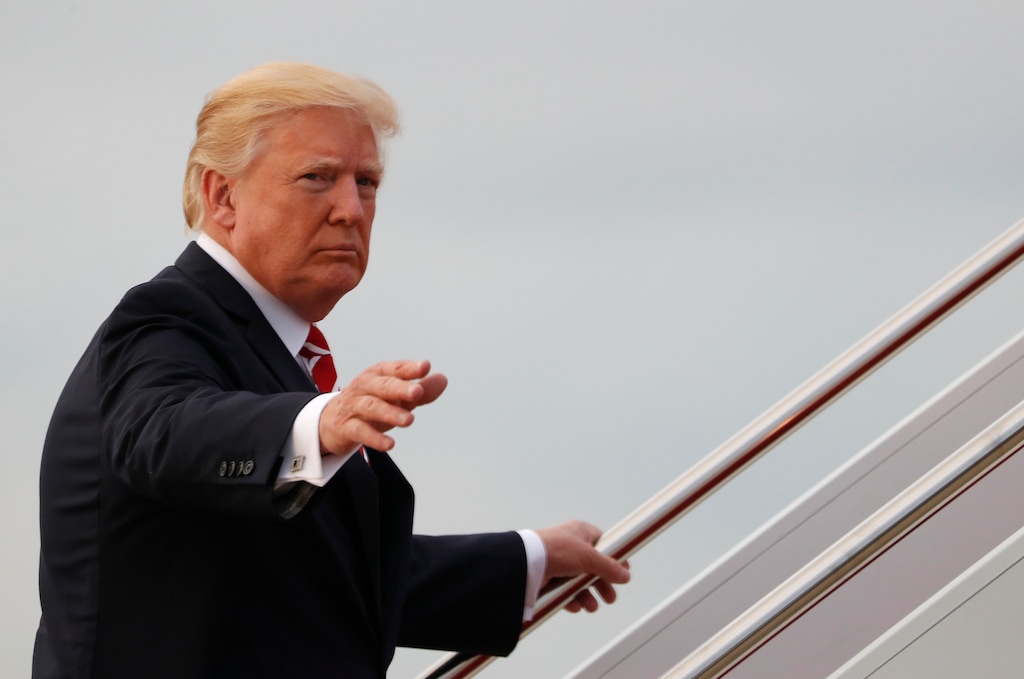 President Donald Trump waves as he boards Air Force One, Saturday, Oct. 7, 2017, in Andrews Air Force Base, Md., en route to a fundraiser in Greensboro, N.C.  Trump is scheduled to visit utah on Monday to shrink the Bears Ears and Grand-Staircase national monuments. (AP Photo/Carolyn Kaster)