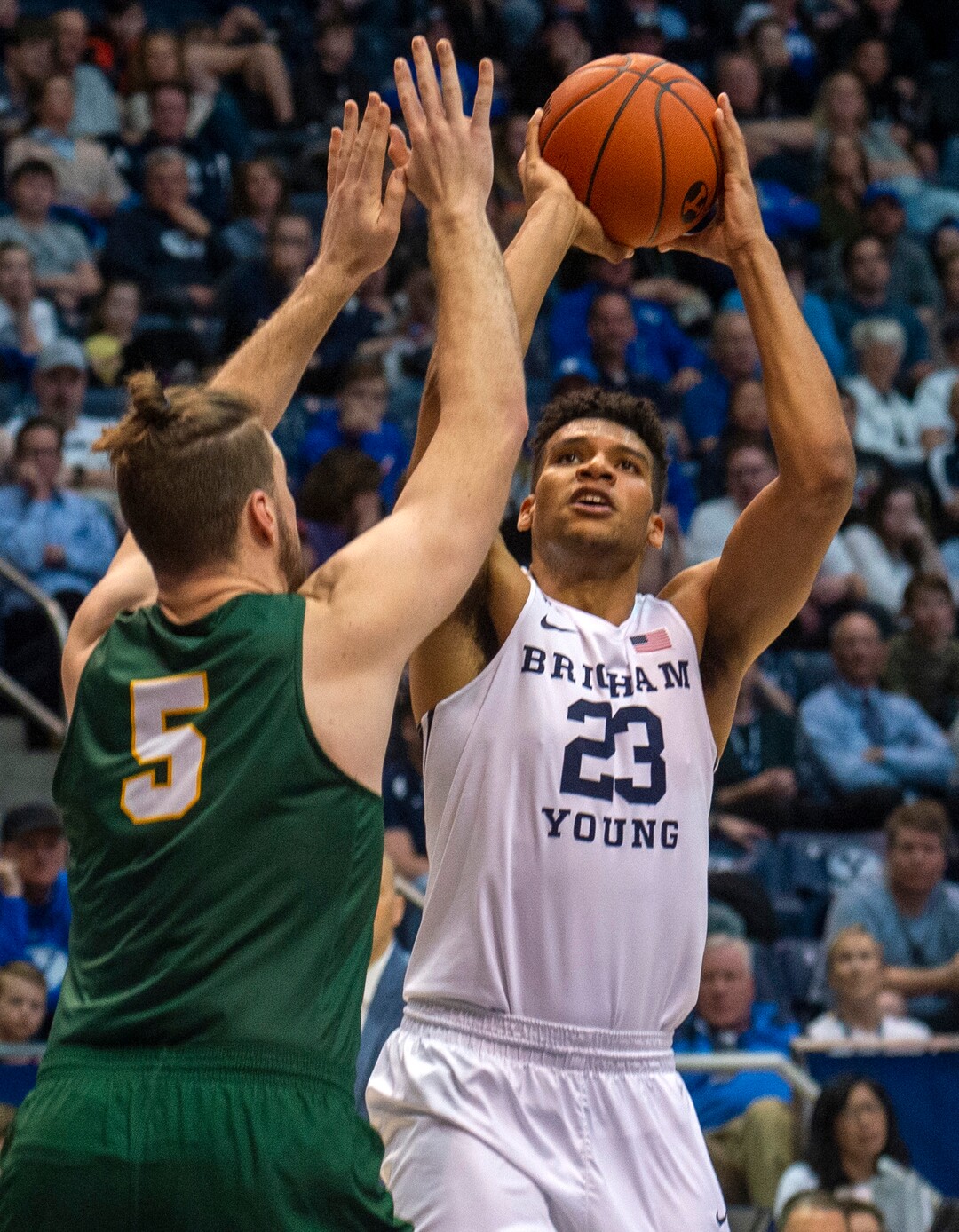 (Rick Egan  |  The Salt Lake Tribune)    Brigham Young Cougars forward Yoeli Childs (23) shoots over San Francisco Dons center Jimbo Lull (5), in WCC basketball acton between the Brigham Young Cougars and the San Francisco Dons, at the Marriott Center, Saturday, Feb. 8, 2020.
