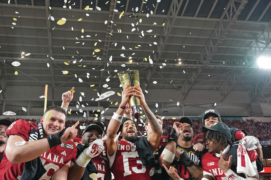 Indiana holds the trophy after their win against Miami in the College Football Playoff national championship game, Monday, Jan. 19, 2026, in Miami Gardens, Fla. (AP Photo/Rebecca Blackwell)