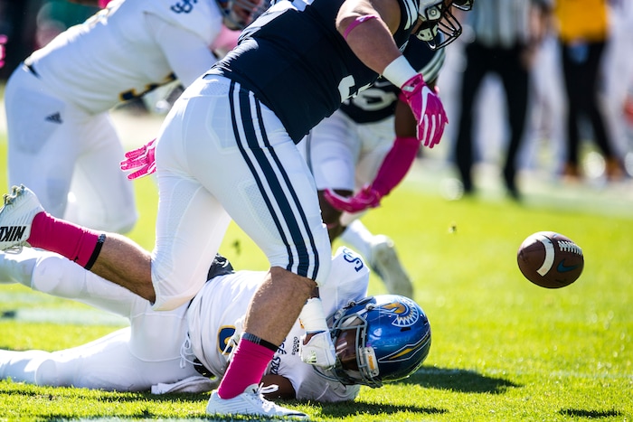 (Chris Detrick  |  The Salt Lake Tribune)  Brigham Young Cougars running back Brayden El-Bakri (35) tackles San Jose State Spartans wide receiver Rahshead Johnson (8) on the opening kick-off during the game at LaVell Edwards Stadium Saturday, October 28, 2017.  