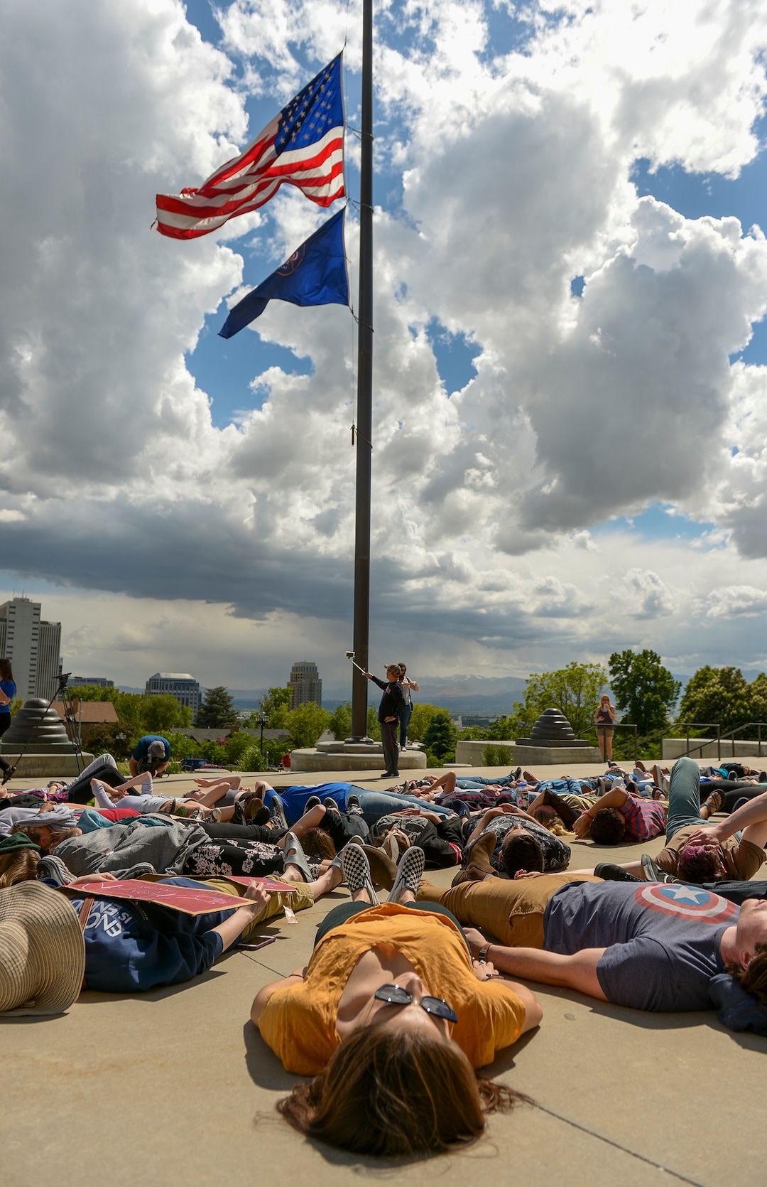 (Leah Hogsten  |  The Salt Lake Tribune)  Over 70 members of March For Our Lives SLC, high school students and concerned citizens gather at the Utah Capitol, Friday, May 18, 2018, to demand gun reform and honor the 10 dead who were killed during Friday morning's shooting spree inside Santa Fe High School in southeast Texas.The participants staged a 22-minute die-in for the 22 school shootings already in 2018. 
