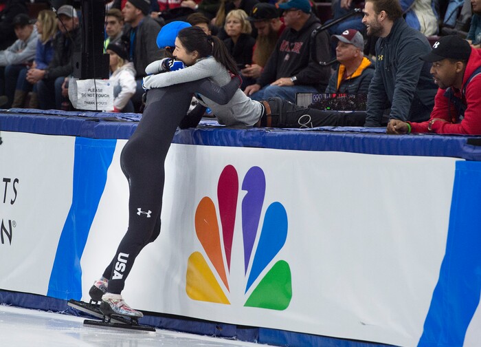 (Scott Sommerdorf   |  The Salt Lake Tribune)   
Lana Gehring gets a hug from a coach after she made the US Olympic team by topping the field in the women's 1000 final and collecting the most points during day 3 of the U.S. short-track Olympic Team Trials at the Utah Olympic Oval, Sunday, December 17, 2017.  
