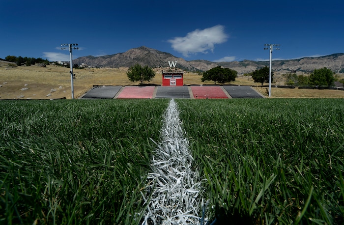 (Scott Sommerdorf   |  The Salt Lake Tribune)   The 50 yard line leads to a view of the stands at Weber High football field, Wednesday, August 9, 2017.  