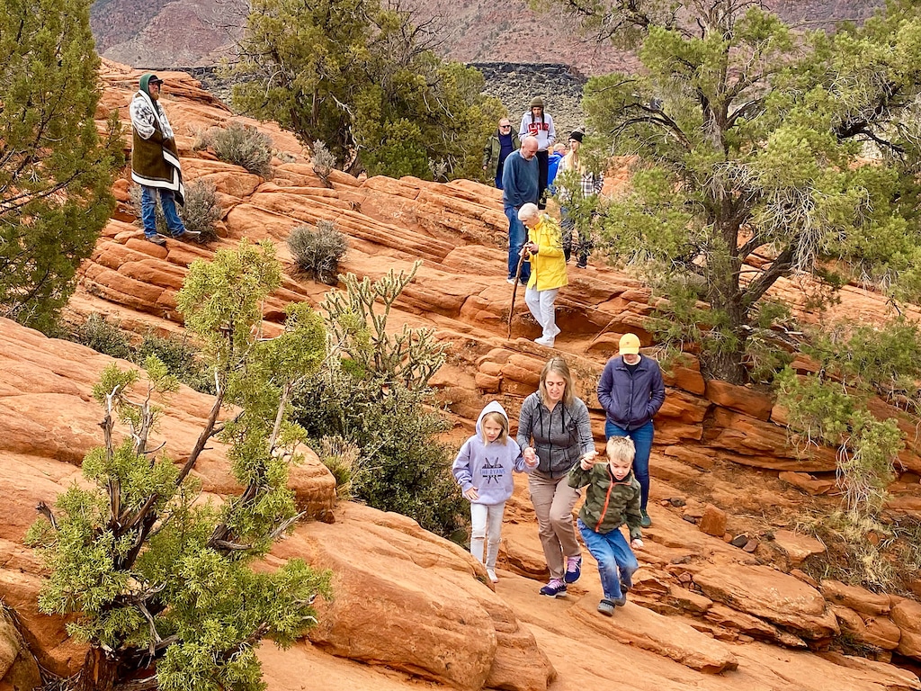 (Mark Eddington | The Salt Lake Tribune) Visitors traverse around Gunlock Falls northwest of St. George, Monday, March 20, 2023, near the Gunlock Reservoir. Rep. Celeste Maloy has proposed selling public land in the area to local governments. 