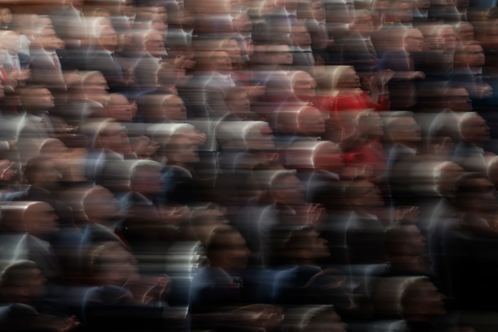 FILE — Republican lawmakers, Cabinet members and senior advisers to President Donald Trump applaud during hiss State of the Union address, in the House of Representatives Chamber at the Capitol building in Washington, Feb. 24, 2026. (Damon Winter/The New York Times)