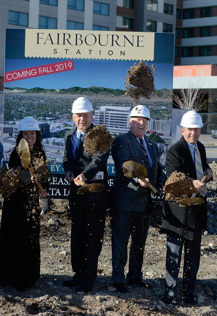 (Francisco Kjolseth | The Salt Lake Tribune) West Valley City Mayor Ron Bigelow, center left, tosses dirt alongside Wasatch Commercial Management founder Dell Loy Hansen, as they break ground Tuesday, Nov. 28, 2017, in West Valley City for the state-of-the-art ÒFairbourne StationÓ that will serve as the cornerstone of the new downtown in UtahÕs second-largest and most diverse city.