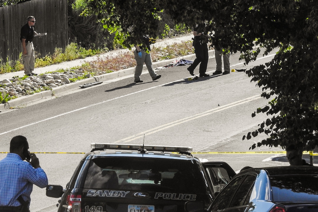 Chris Detrick  |  The Salt Lake TribunePolice officers investigate the scene of a shooting Tuesday, June 6, 2017. The shooting occurred at about 3:45 p.m. outside of a residence at about 2175 East and Alta Canyon Drive (about 8630 South), said Sandy police Sgt. Jason Nielsen. Nielsen said the shooter was among the dead and, therefore, there is no threat to the public.