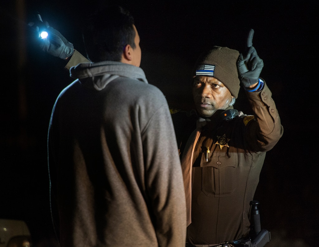 (Rick Egan  |  Tribune file photo)     Utah Highway Patrol Trooper Daud Eftin and Trooper Kelley Jensen give a field sobriety test during a DUI blitz on New Year's Eve.  The subject was released after passing the test. Monday, Dec. 31, 2018.