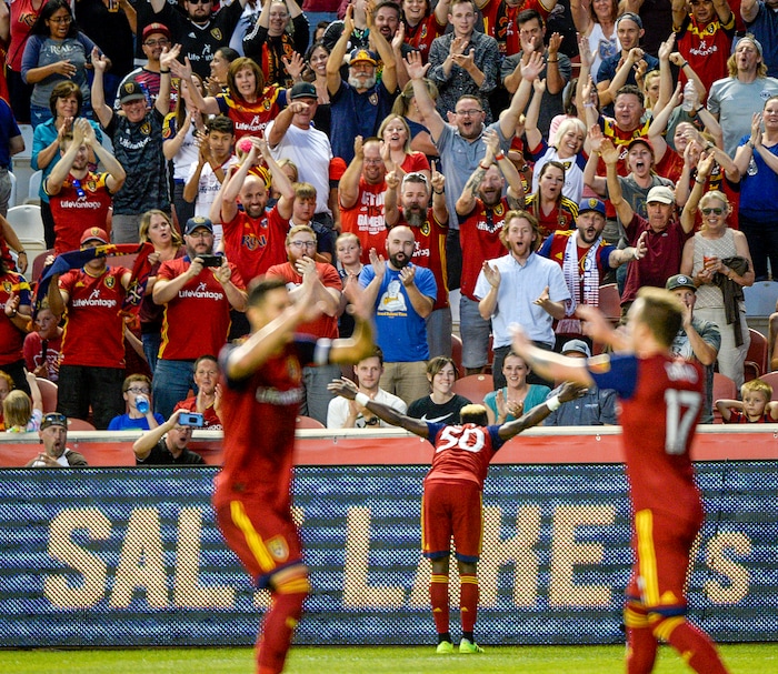 (Leah Hogsten  |  The Salt Lake Tribune) Real Salt Lake forward Sam Johnson (50) celebrates his goal with fans as Real Salt Lake hosts the Seattle Sounders, Aug. 14, 2019, at Rio Tinto Stadium in Sandy.