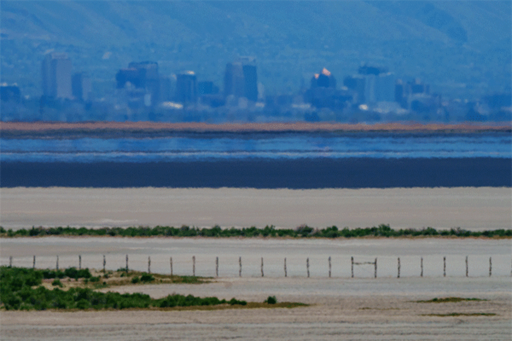 (Trent Nelson  |  The Salt Lake Tribune) The shore of the Great Salt Lake, with Salt Lake City in the distance, as seen from Antelope Island on Thursday, May 1, 2025.