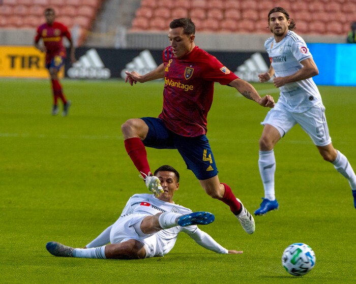 (Rick Egan  |  The Salt Lake Tribune)  Real Salt Lake defender Donny Toia (4) goes for the ball as Los Angeles FC defender Andy Najar defends, in MLS soccer action between Real Salt Lake and Los Angeles FC at Rio Tinto Stadium, on Wednesday, Sept. 9, 2020.


