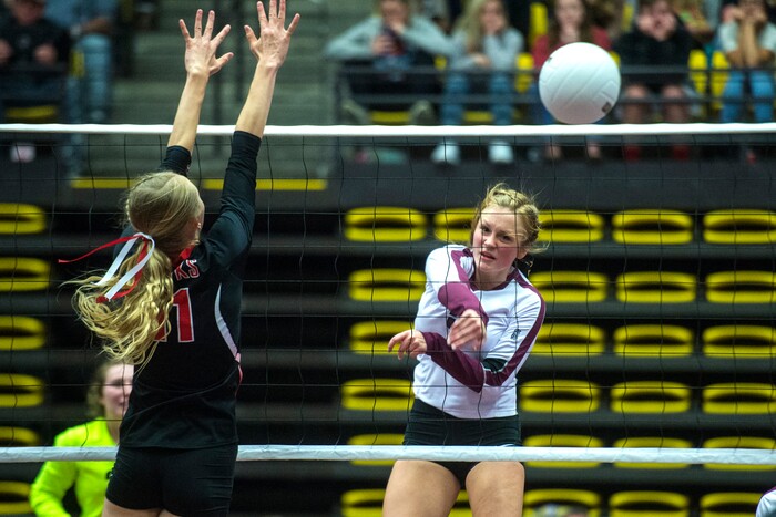 (Chris Detrick  |  The Salt Lake Tribune)  Morgan's Brooke Loertscher (5) spikes past North Sanpete's Linzy Flinders (11) during the the 3A volleyball state championships at the UCCU Center at Utah Valley University Thursday, October 26, 2017.  Morgan defeated North Sanpete 3-0.