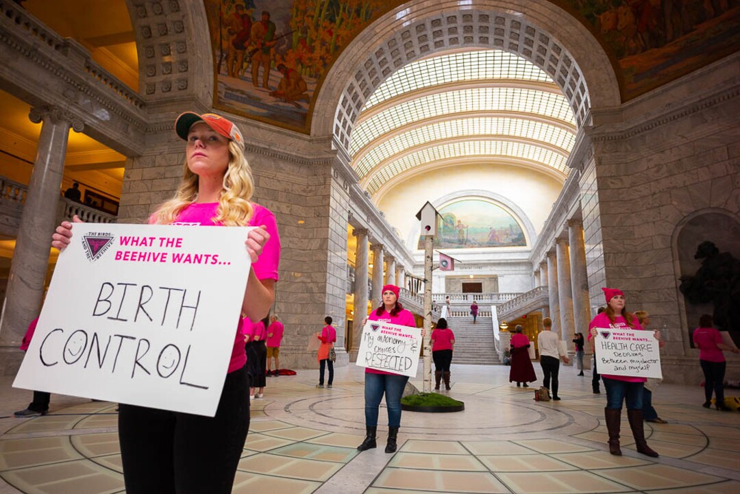 (Trent Nelson | The Salt Lake Tribune)  Kelsey Askea and other supporters of Planned Parenthood Association of Utah gathered in a silent protest in the Utah State Capitol Rotunda Friday March 1, 2019, while a 12-foot birdhouse art installation broadcast statements from Utah constituents.