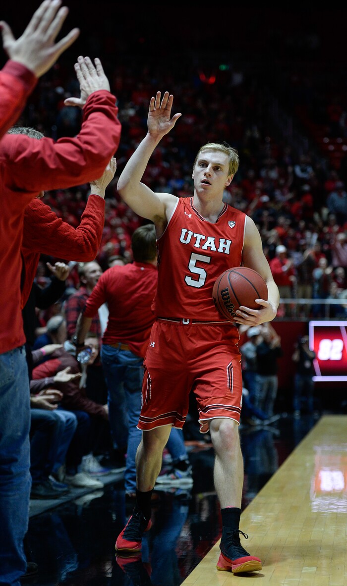 (Francisco Kjolseth  |  The Salt Lake Tribune)  Utah Utes guard Parker Van Dyke (5) celebrates with the fans after playing a critical role in their win over UCLA at the Huntsman Center in Salt Lake City, Thursday, Feb. 22, 2018.