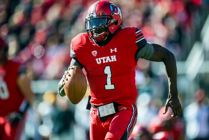 (Chris Detrick  |  The Salt Lake Tribune)  Utah Utes quarterback Tyler Huntley (1) runs the ball during the game at Rice-Eccles Stadium Saturday, October 21, 2017. 