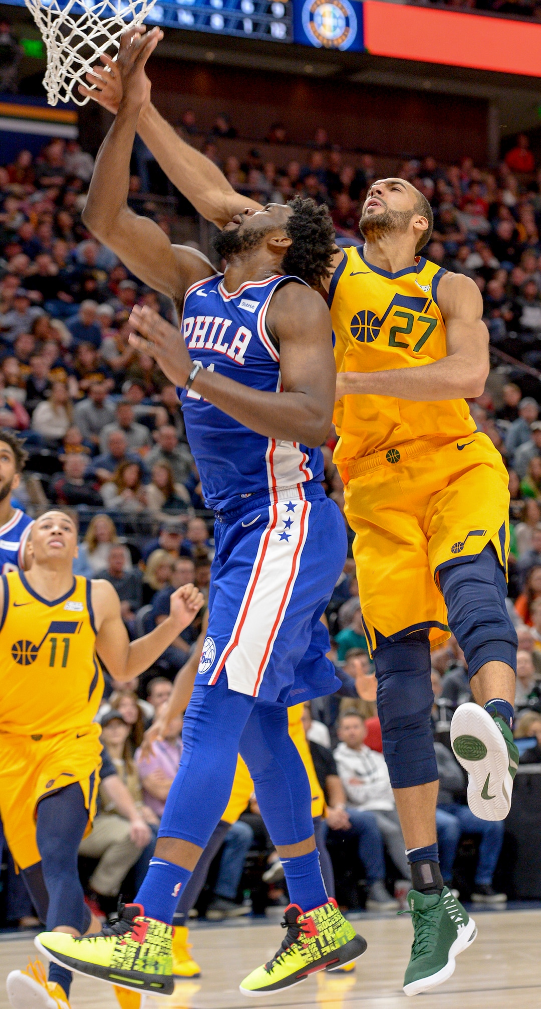 Leah Hogsten  |  The Salt Lake Tribune  Utah Jazz center Rudy Gobert (27) battles Philadelphia 76ers center Joel Embiid (21). The Philadelphia 76ers defeated the Utah Jazz 114- 97 at Vivint Smart Home Arena, Thursday, December 27, 2018. 